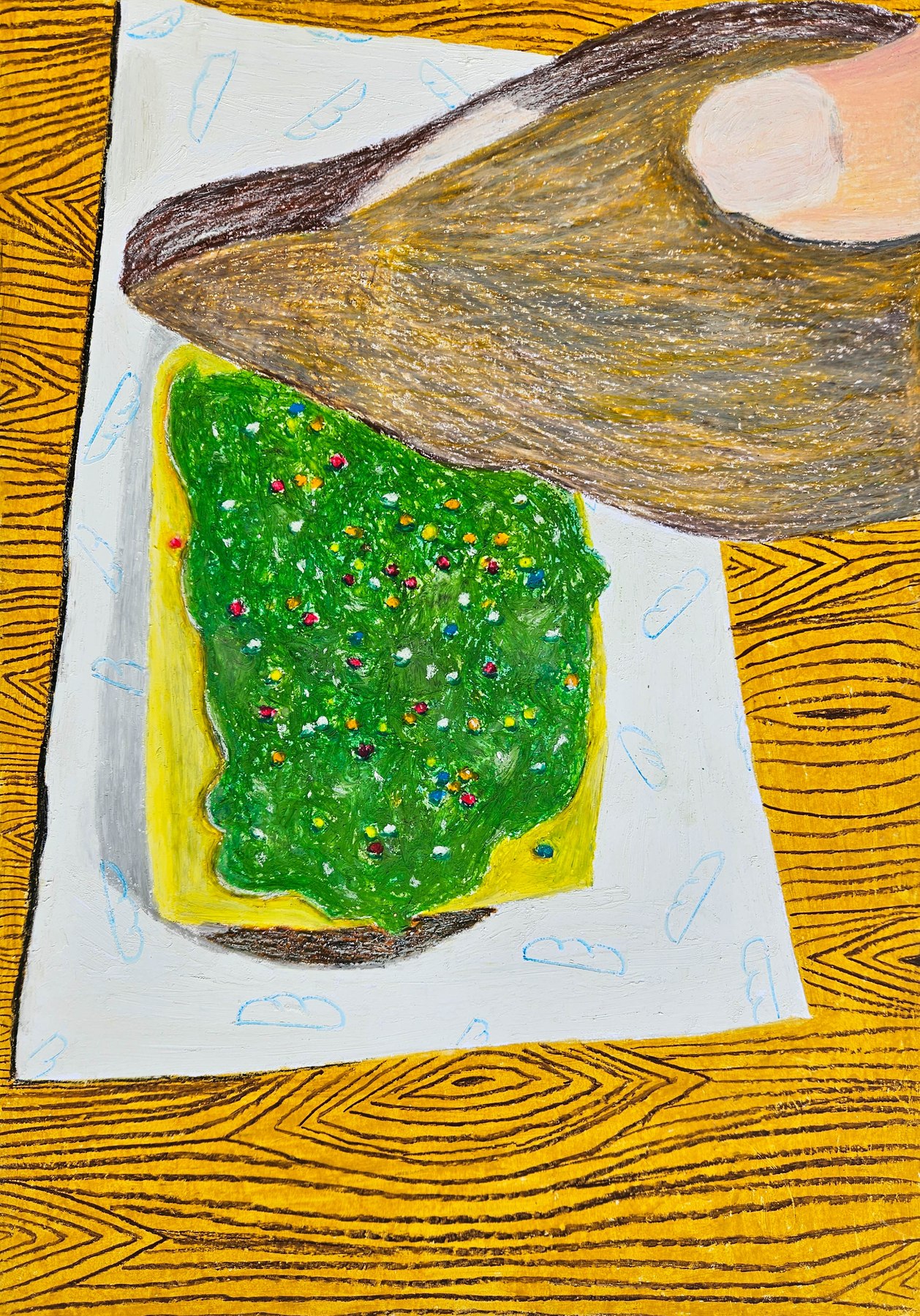 Oil pastel still life of a hand holding a slice of bread with pesto spread and colorful sprinkles on a wood table