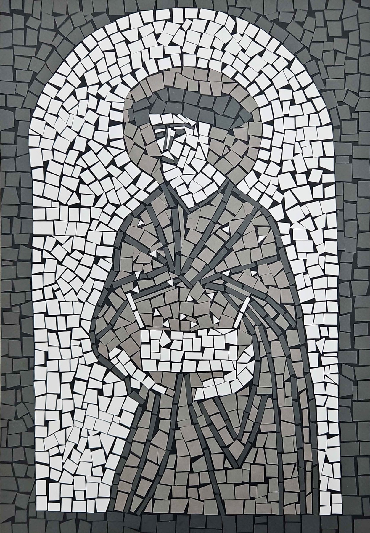 Hand-cut paper mosaic of a robed figure in prayer, in black, white and grey