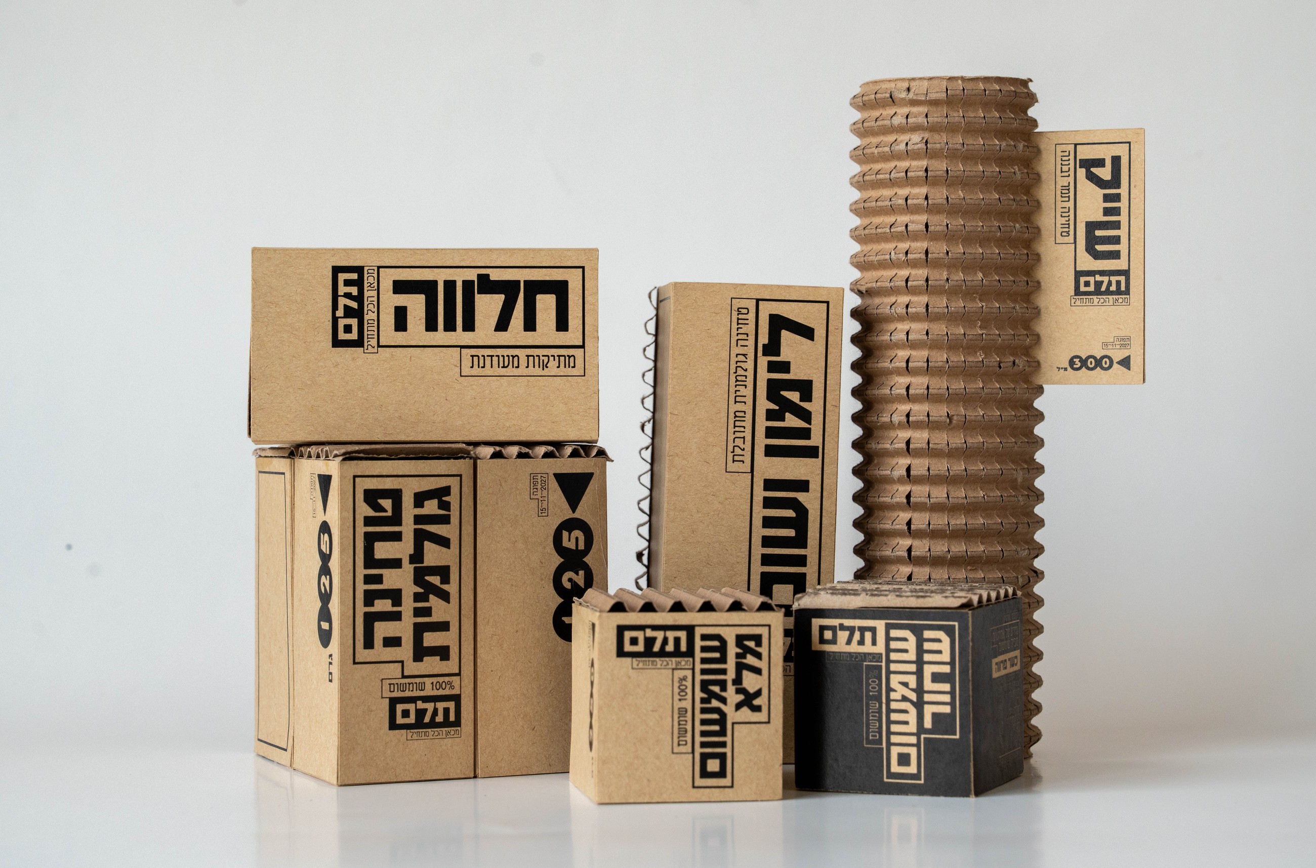 Telem complete packaging family — halva, raw tahini, lemon and garlic tahini, sesame, and shake tube grouped together