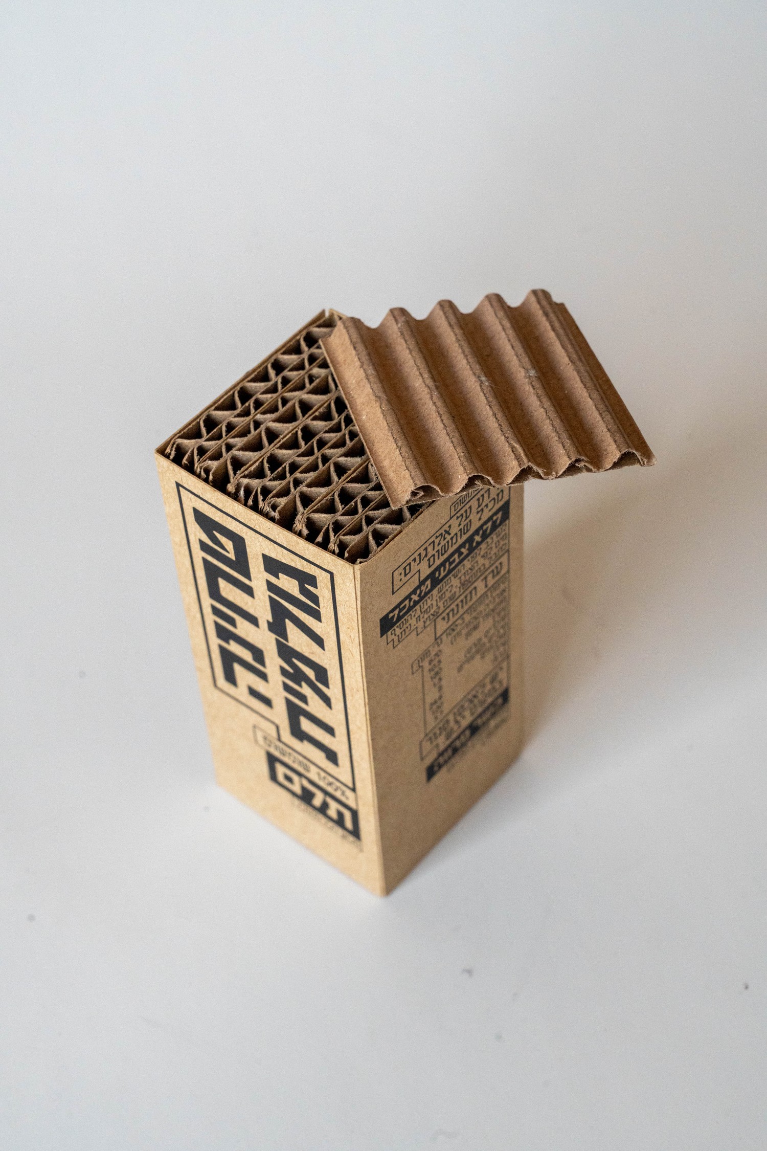 Telem box with corrugated flap open, roof-like construction detail